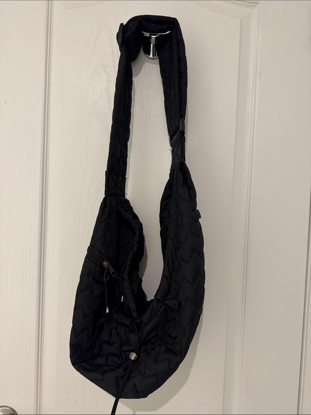 Top Paw Quilted Sling Crossbody Bag in Black